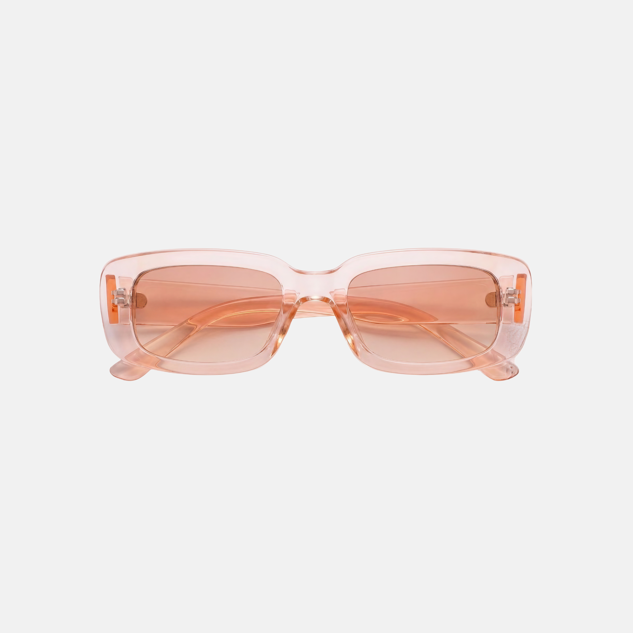 Pink sunglasses on a light gray background