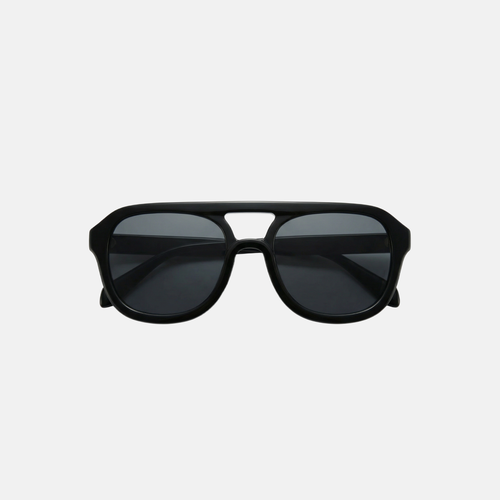 Black sunglasses on a light gray background