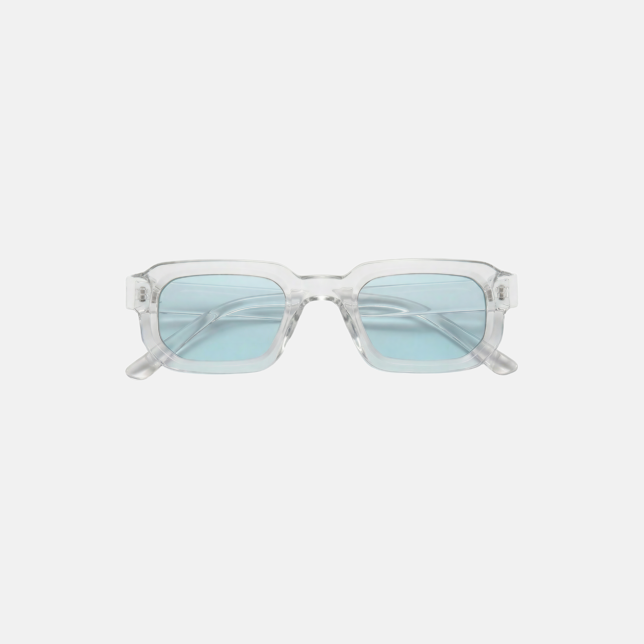 Sunglasses with light blue lenses on a white background